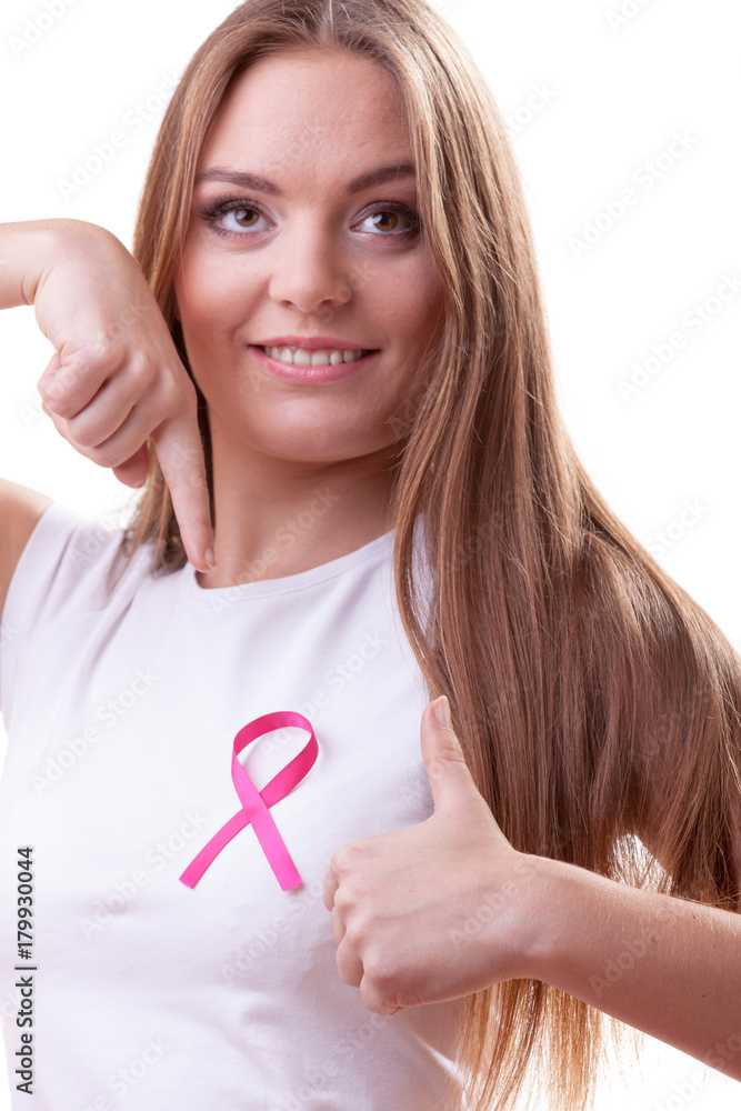 woman pink cancer ribbon on chest making thumb up woman pink cancer ribbon on chest making thumb up
