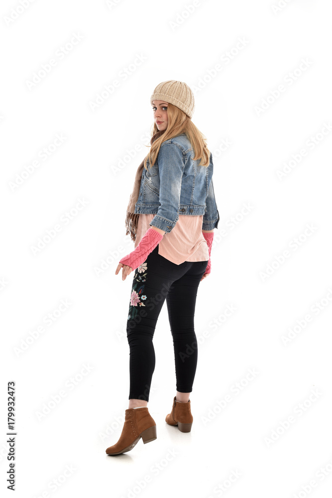 full length portrait of cute girl wearing autumn fashion, standing pose isolated on white background. full length portrait of cute girl wearing autumn fashion, standing pose isolated on white background.