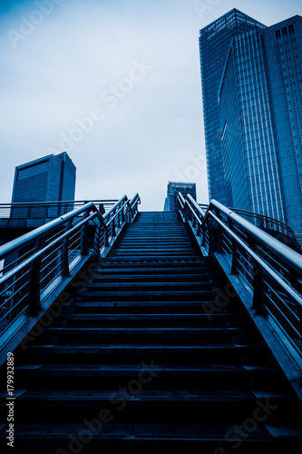 the Stairs with modern buildings in the cityscape.