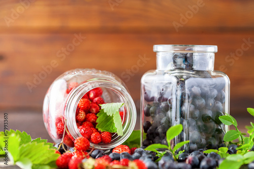 Fresh and healthy forest berries, blueberries and strawberries. Selective focus