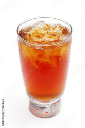 A cup of ice black tea on white background