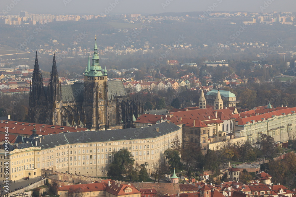 View on colorful autumn Prague City with its Towers and historical Buildings, Czech Republic