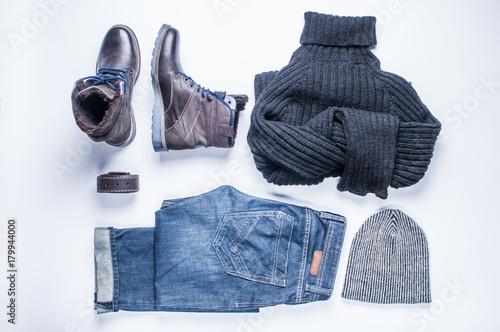 Men's winter clothes on white background. Flat lay and top view