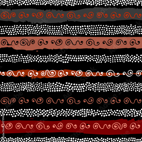 Ethnic boho seamless pattern in african style on black background. Tribal art print. Irregular polka dots pattern.
