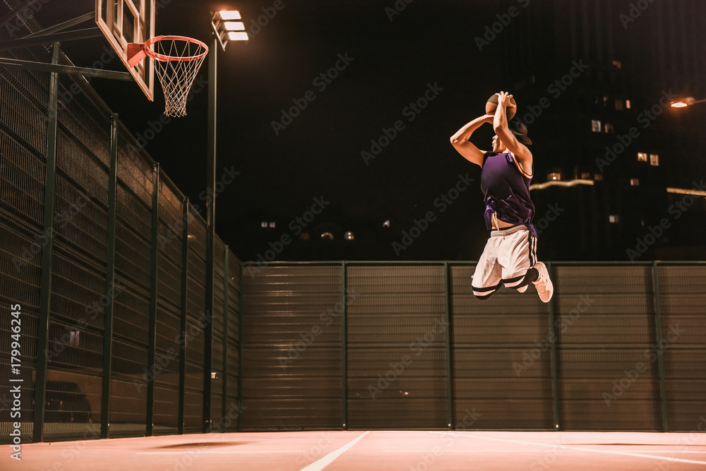 Fototapeta premium Stylish basketball player