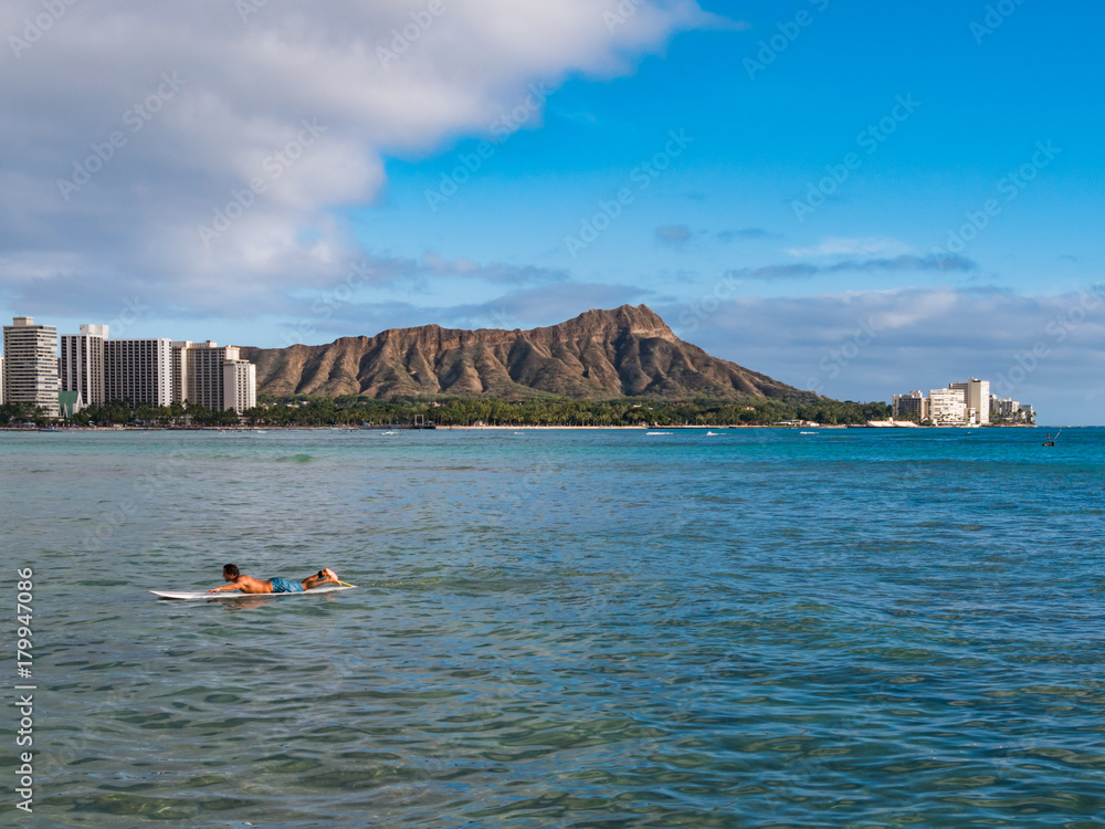 Waikiki Beach and Diamond Head Crater including the hotels and buildings in Waikiki, Honolulu, Oahu island, Hawaii. Waikiki Beach in the center of Honolulu has the largest number of visitors in Hawaii
