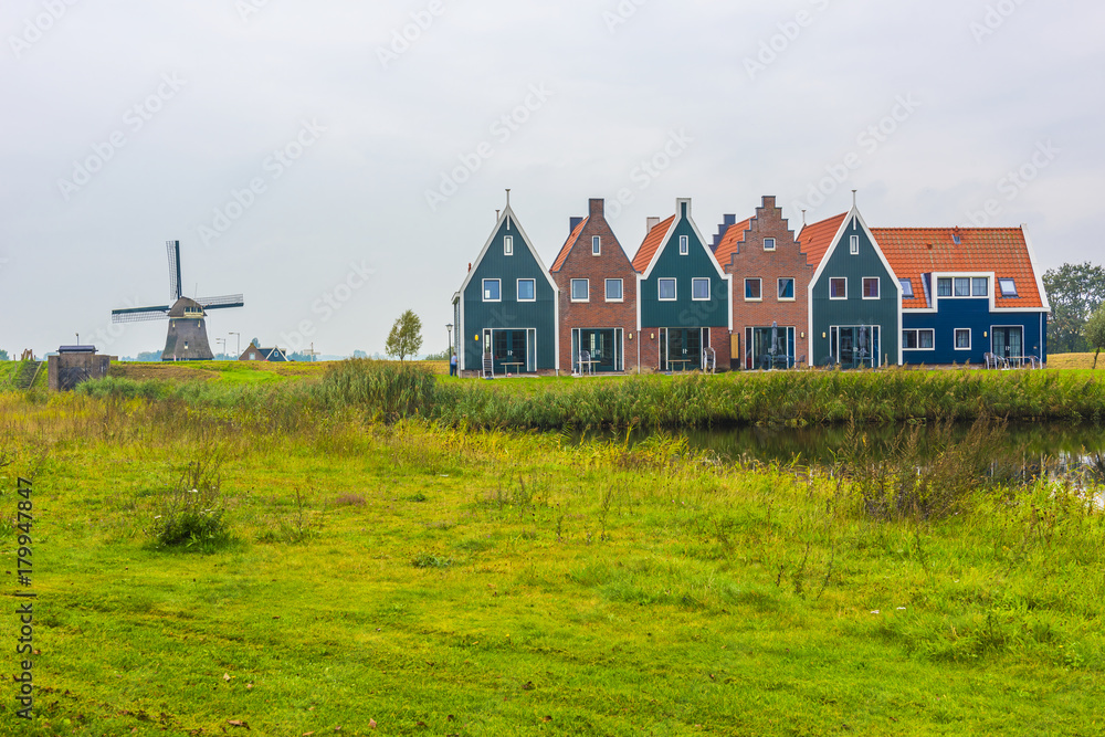 Volendam is a town in North Holland in the Netherlands. Colored houses of marine park in Volendam. North Holland, Netherlands. Volendam is a town in North Holland in the Netherlands. Colored houses of marine park in Volendam. North Holland, Netherlands.