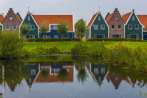 Volendam is a town in North Holland in the Netherlands. Colored houses of marine park in Volendam. North Holland, Netherlands.