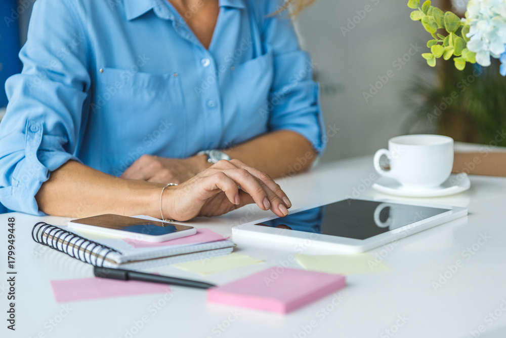 businesswoman with tablet and smartphone businesswoman with tablet and smartphone