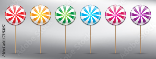 Set of 6 colorful lollipops. Round candy on stick with swirl design. Lollipop icon set. Design elements for holiday cards. Realistic and isolated on the white panel. Vector illustration. Eps10.