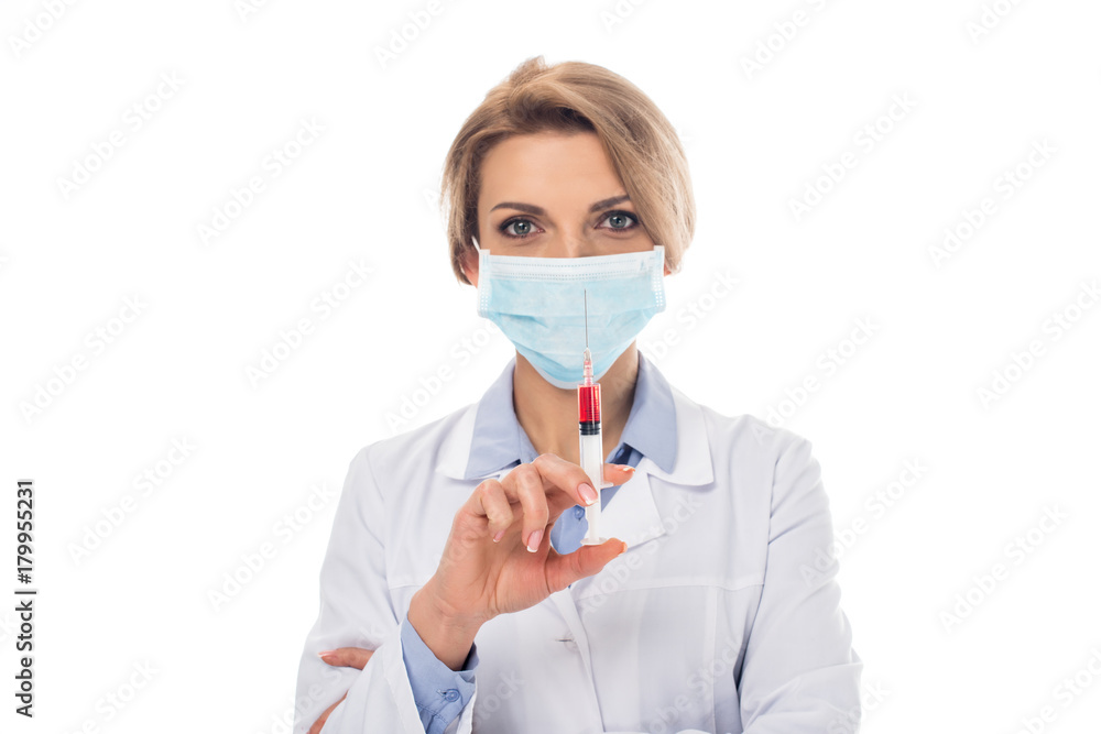 doctor with syringe of blood