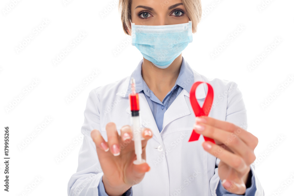 doctor with syringe and aids ribbon doctor with syringe and aids ribbon