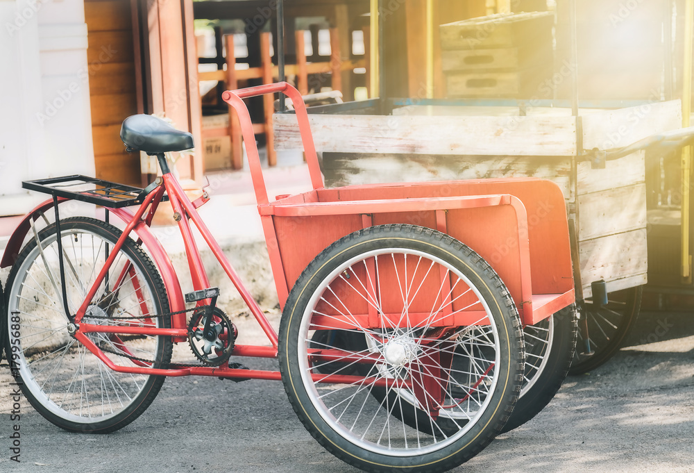 The local red tricycle is unique in Thailand. The local red tricycle is unique in Thailand.