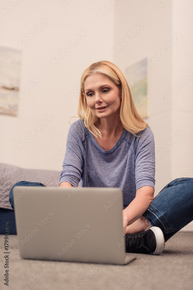 woman using laptop at home woman using laptop at home