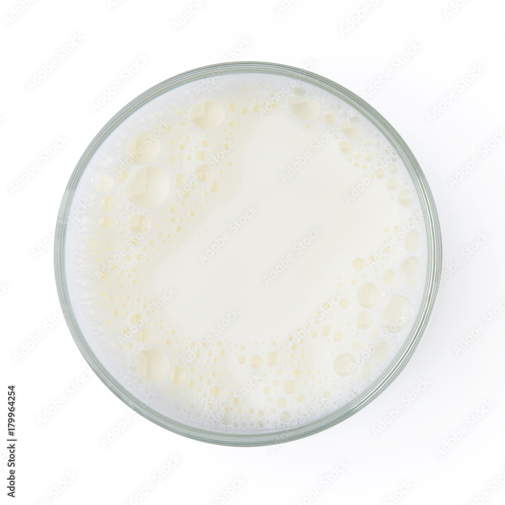 Cup with milk bubble foam isolated on white background top view texture object design Cup with milk bubble foam isolated on white background top view texture object design