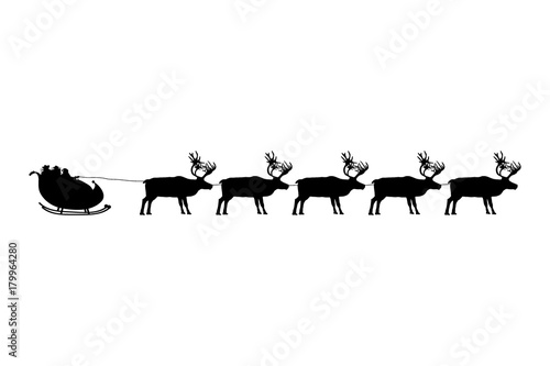 Santa Claus rides in a sleigh in harness on the reindeer © Basthamp