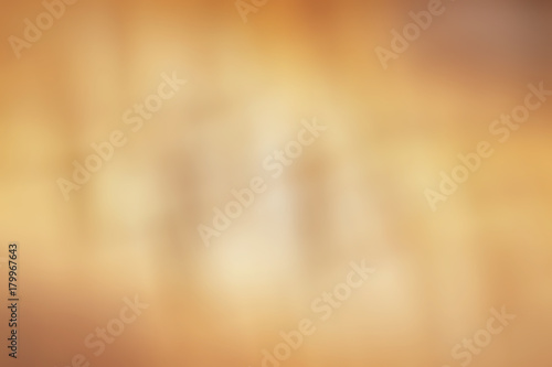 abstract orange background with stripes and light and dark spots