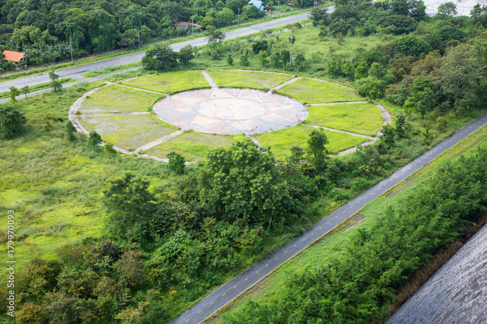 Bird eye view of trail in an open green field