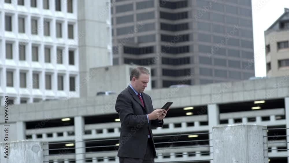 Businessman working and typing on tablet Businessman working and typing on tablet