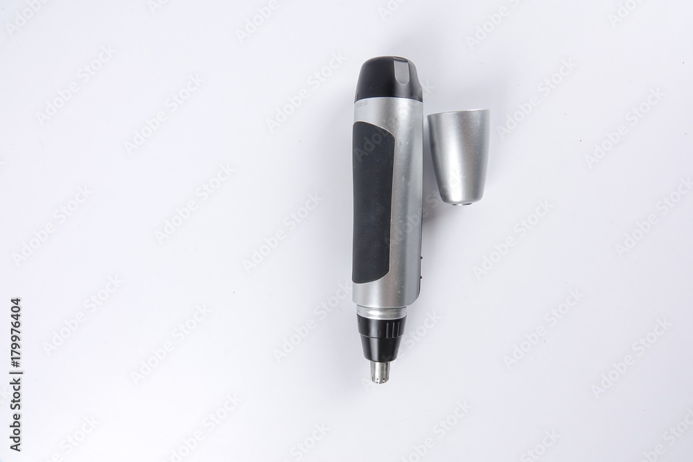 Fototapeta premium Battery powered nose hair trimmer isolated on white.