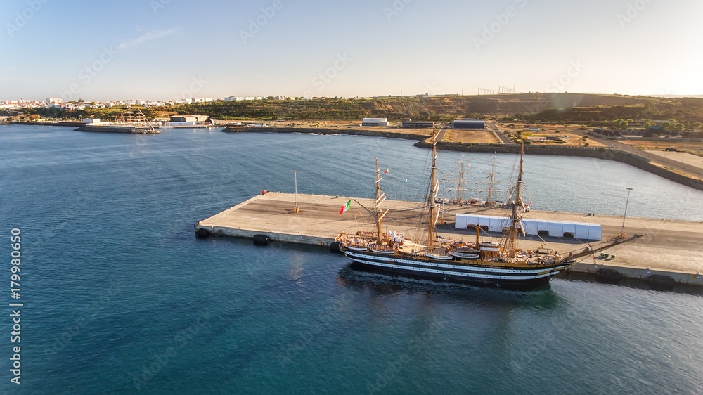 Aerial. Portuguese sea port Sinis with sailboats in regatta. Photographing from the drone.