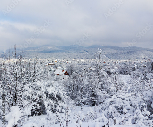 winter landscape with village in the foothills of the Caucasus