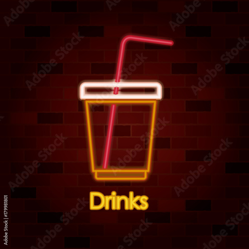 drinks on neon sign on brick wall