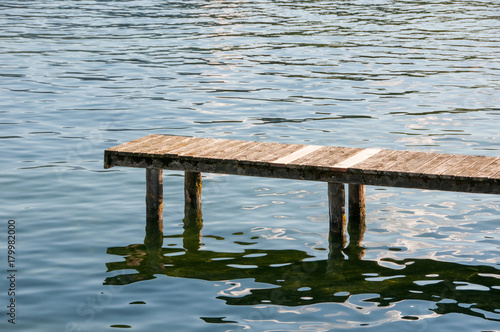 boardwalk with calm lake