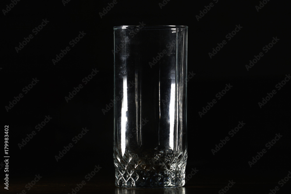 clear crystal empty glass on a black background. clear crystal empty glass on a black background.