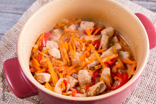 Meat with vegetables in a pan