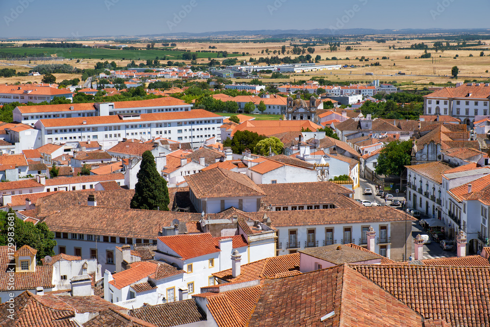 The view of city residential houses which surround the Cathedral (Se) of Evora. Portugal