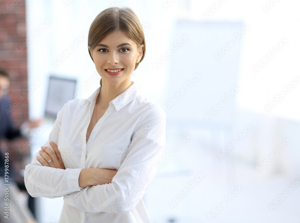 portrait of young business woman on the background of the office portrait of young business woman on the background of the office