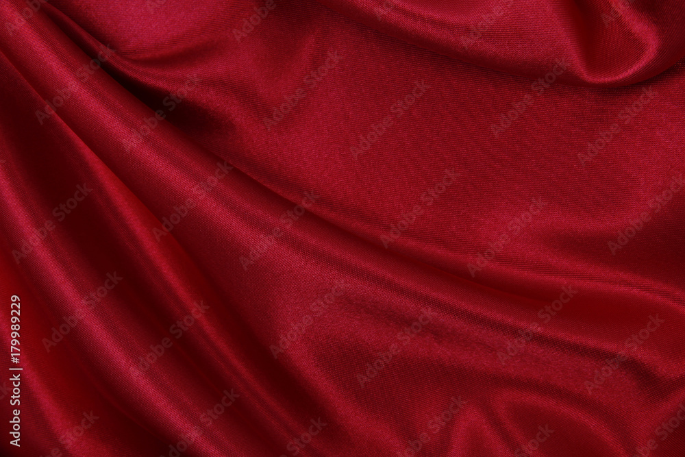 Smooth elegant red silk or satin luxury cloth texture as abstract background. Luxurious valentines day background design Smooth elegant red silk or satin luxury cloth texture as abstract background. Luxurious valentines day background design
