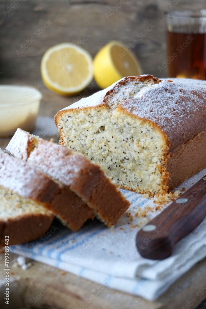 Lemon cake with poppy seeds and powdered sugar