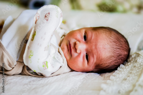 Newborn little baby cries and screams