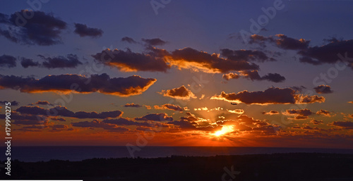 Paphos sunset with aeroplane coming into land at the International airport © Garden Guru