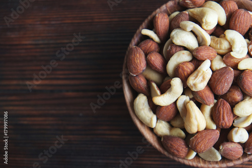 Healthy mix nuts on wooden background