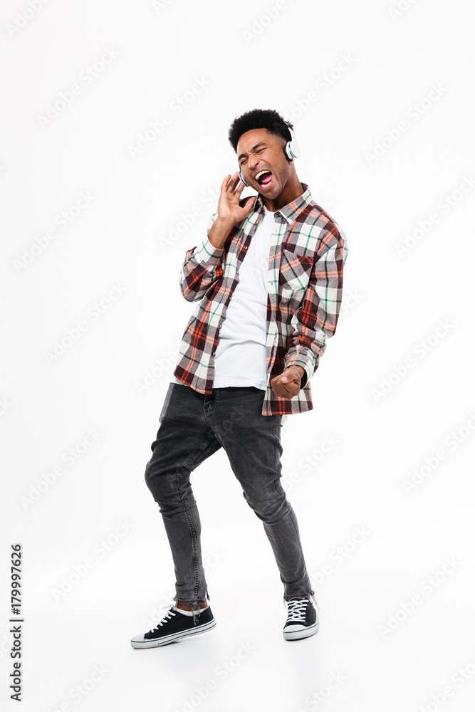 Full length portrait of a pleased young afro american man Full length portrait of a pleased young afro american man