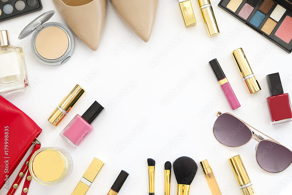Flat lay feminine accessories collage with beige high heel shoes, sunglasses and cosmetics set on white background. Text space. Beauty blog fashion concept. Flat lay feminine accessories collage with beige high heel shoes, sunglasses and cosmetics set on white background. Text space. Beauty blog fashion concept.