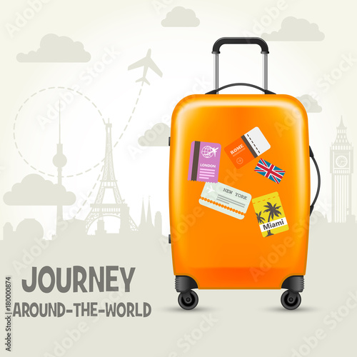 Modern suitcase with travel tags - sightsseeing around the world photo