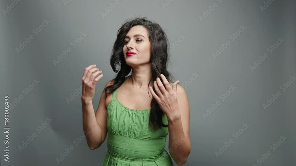 Portrait of bown haired woman. Confetti in party booth Portrait of bown haired woman. Confetti in party booth