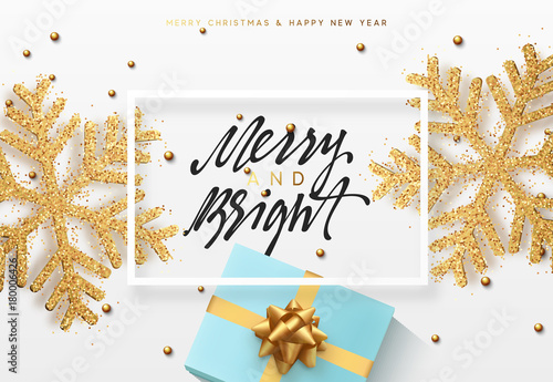 Christmas background with gifts and shining golden snowflakes