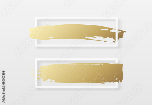Brush golden stroke texture in a frame. Brush gold watercolor background. Design for headline and sale banner.