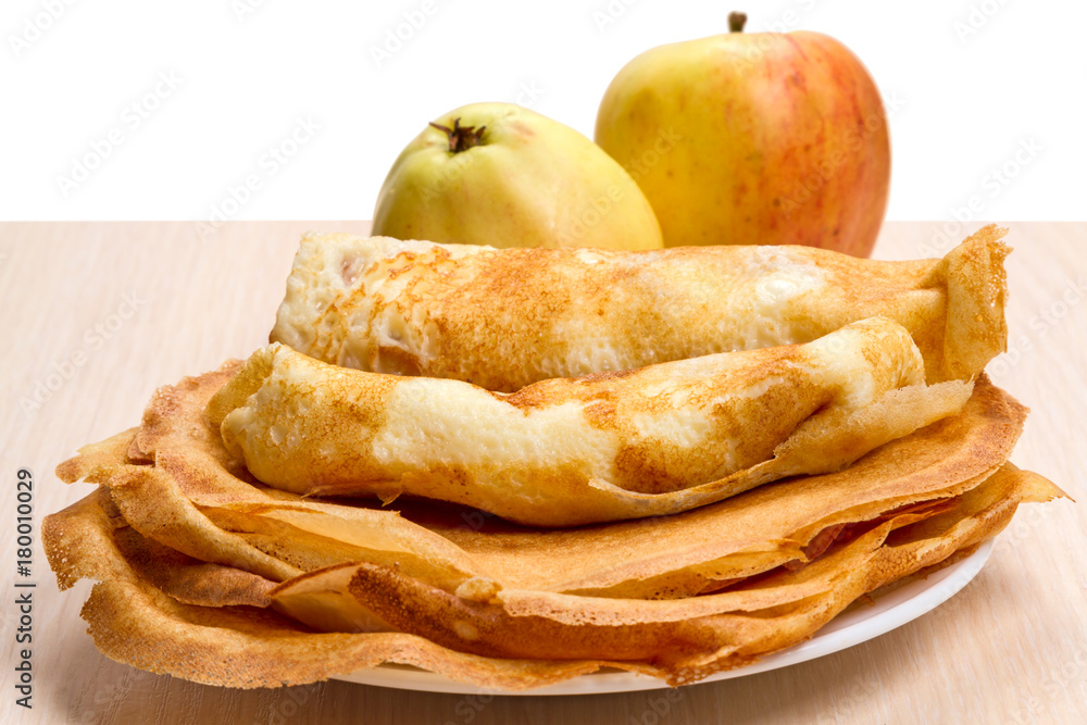 Plate with pancakes and apples Plate with pancakes and apples