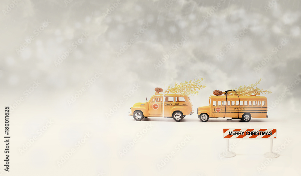 School buses toy model.Christmas concept background in vintage color.