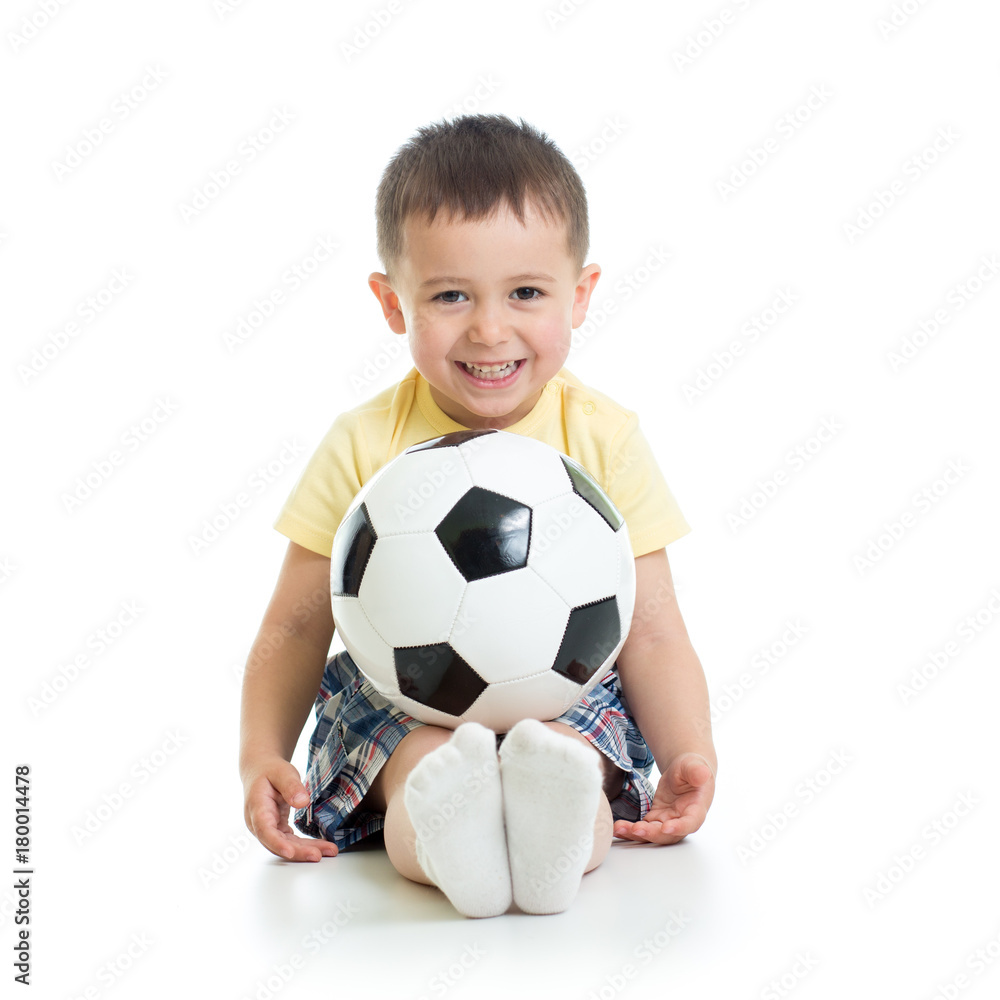 little boy with soccer ball isolated in white