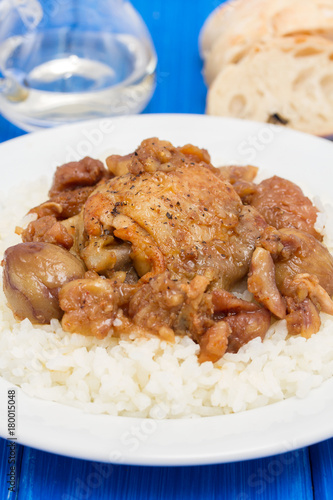 chicken with chestnuts and boiled rice on dish
