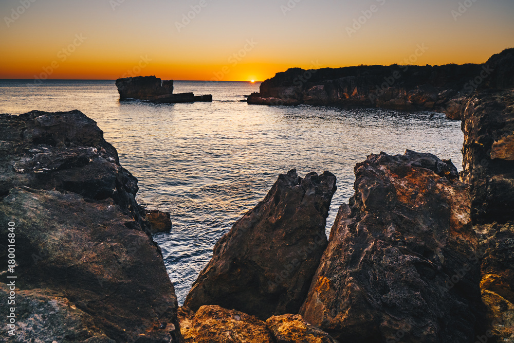 Sunset in Cascais, Portugal at Boca del Inferno famous spot for watching sunsets