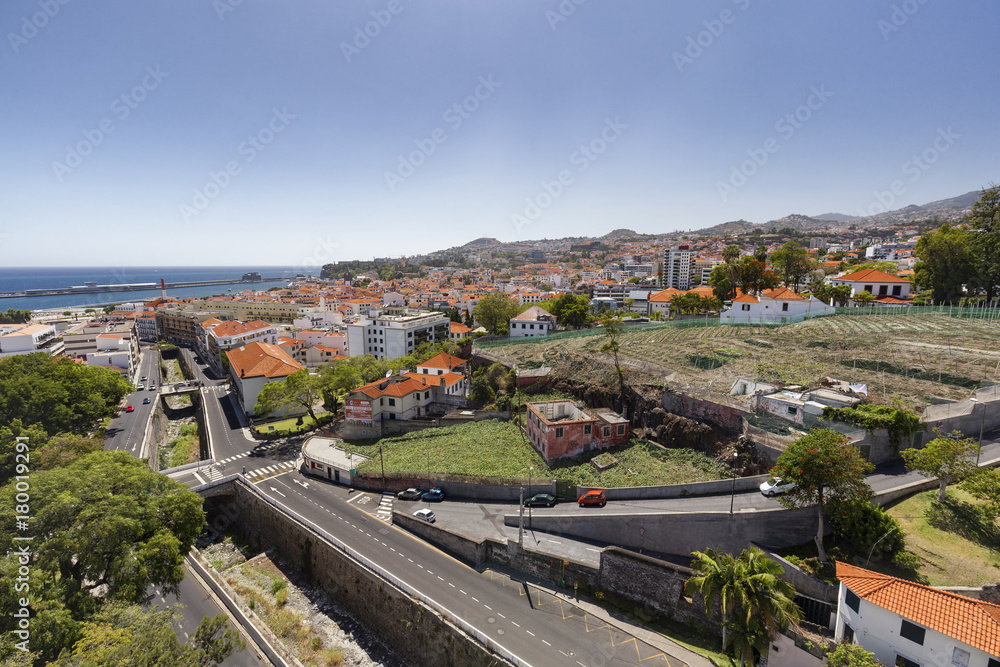 Aerial view of a dry canal leading to the sea in the city of Funchal in Madeira.