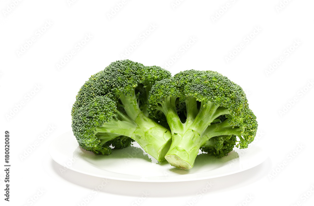 fresh eco-friendly broccoli on white plate